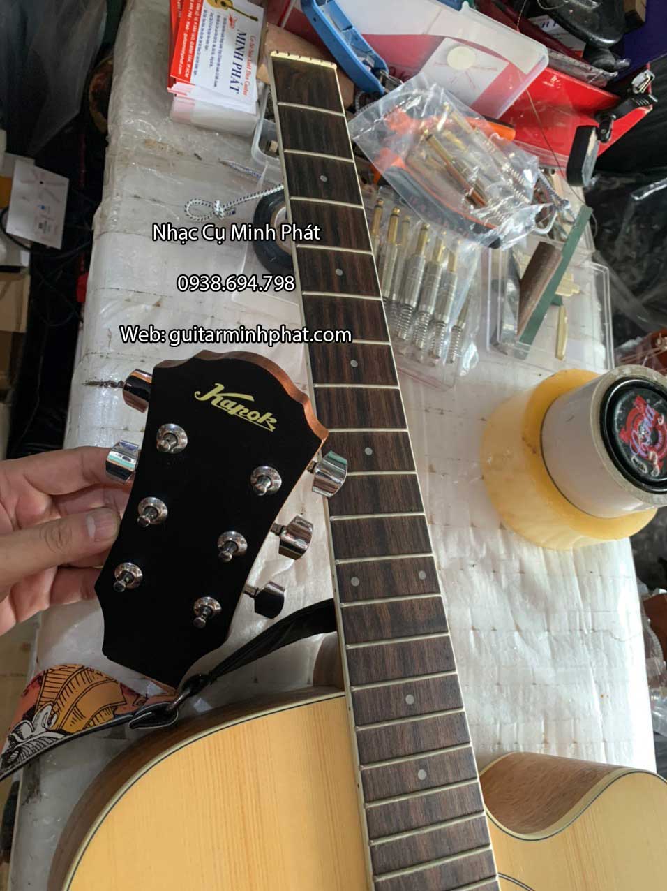 nhan-sua-dan-guitar-kapok-gay-ngang-dau-can (1).jpg