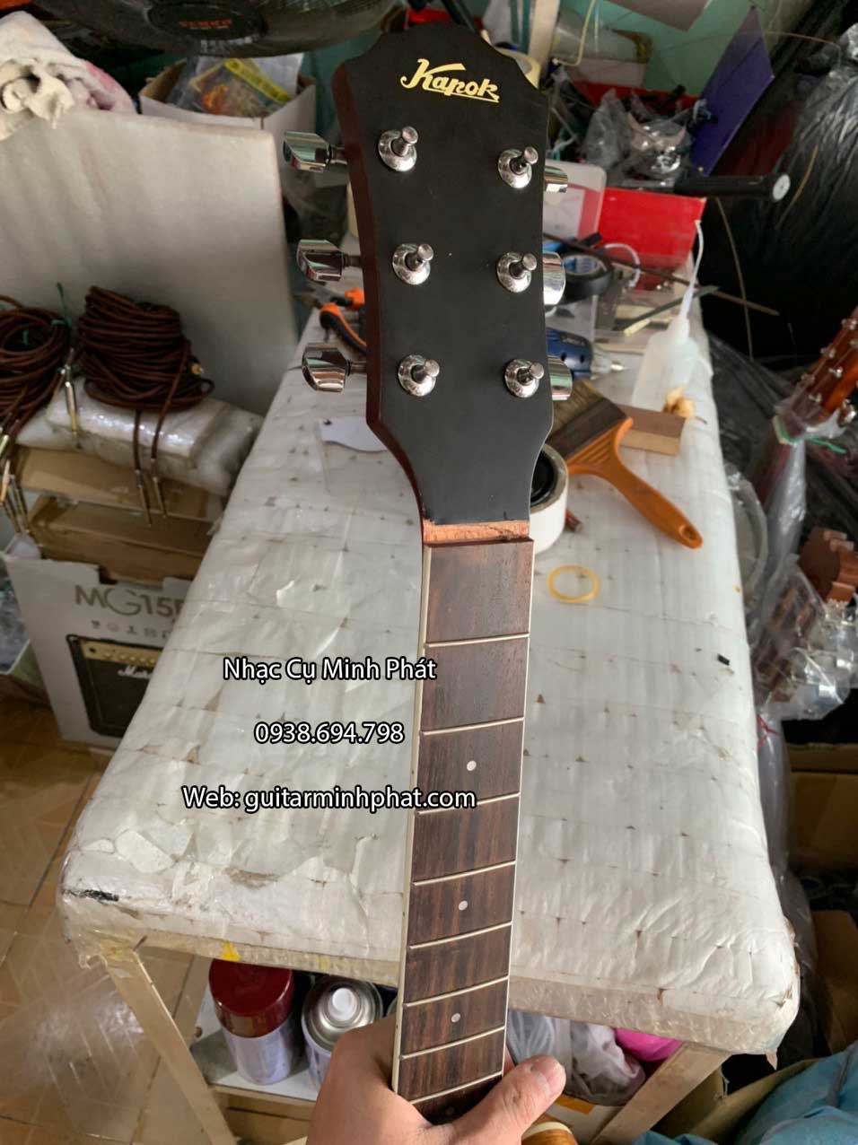 nhan-sua-dan-guitar-kapok-gay-ngang-dau-can (2).jpg