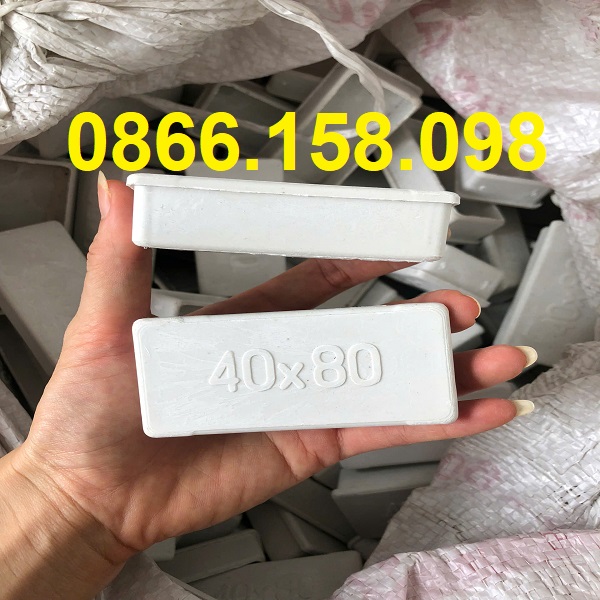 nut-nhua-bit-dau-sat-hop-40x80mm.jpg